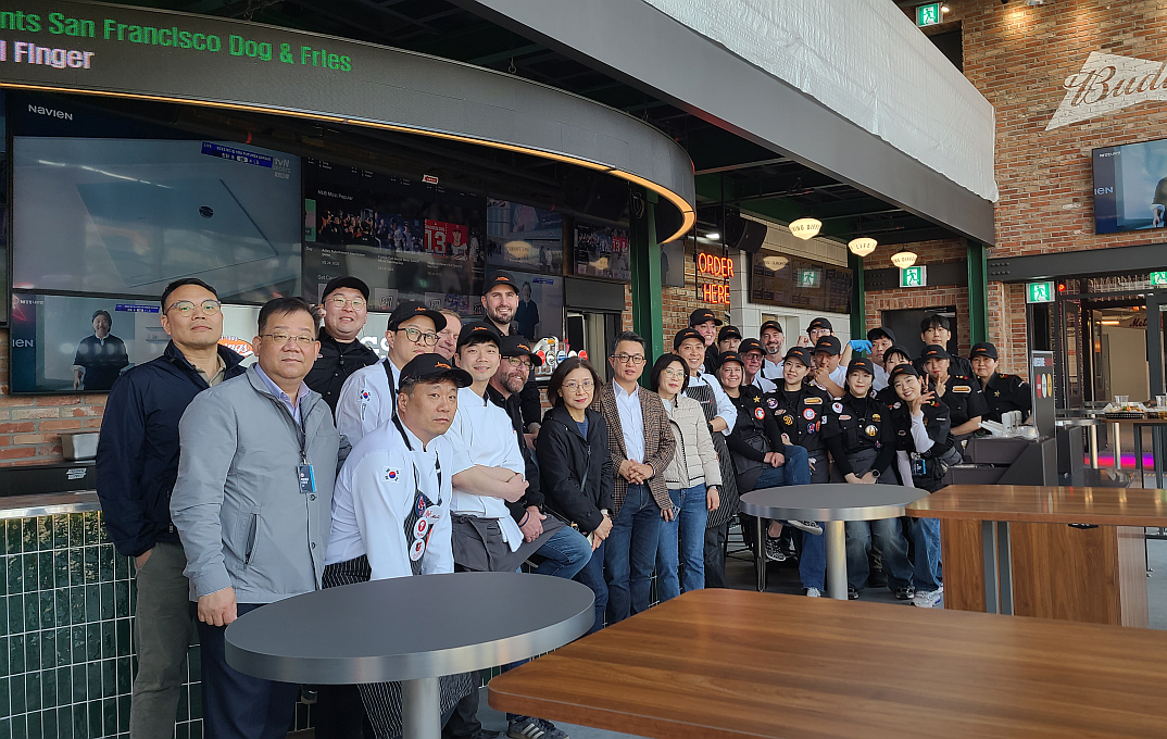 Team from Aramark inside Innings restaurant